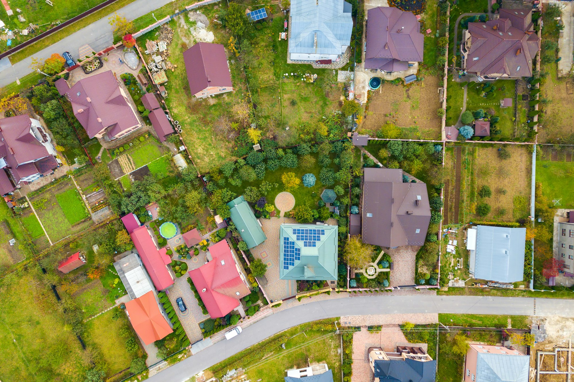 Aerial view of home roofs in residential rural neighborhood area