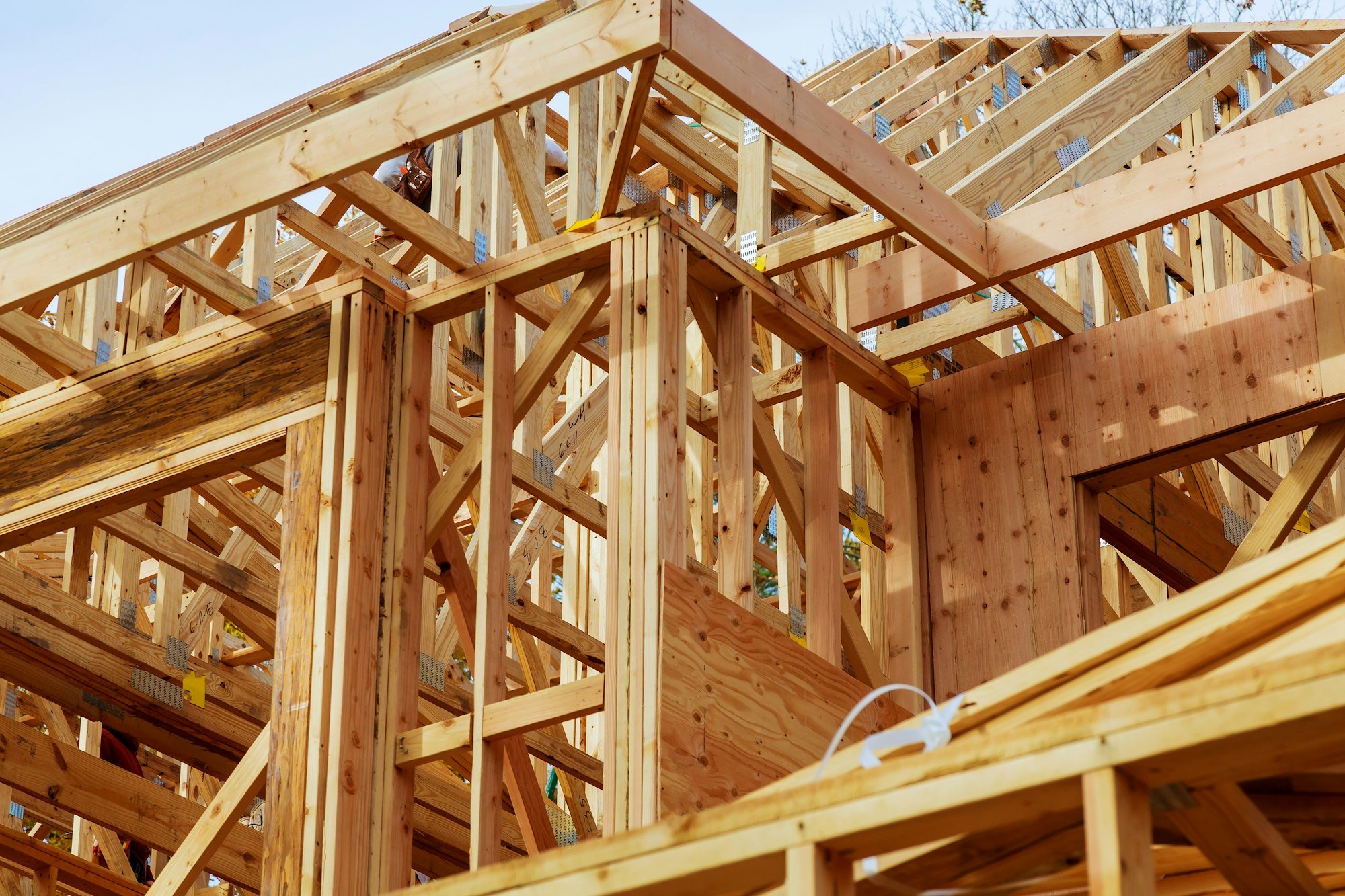 Close-up of gables roof on stick built home under construction New build roof with wooden truss